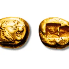 Deux pièces anciennes, l'une avec une tête de lion, l'autre avec des carrés, témoignent de la valeur d'un objet en cuivre.