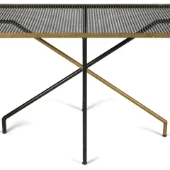 Table basse iconique de Mathieu Mategot, plateau en métal perforé et piètement croisé en métal noir et laiton.