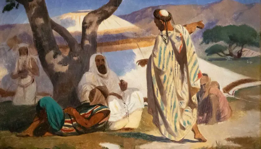 Scène orientale peinte par Prosper Marilhat. Des personnages en habits traditionnels discutent sous un arbre, dans un paysage désertique.