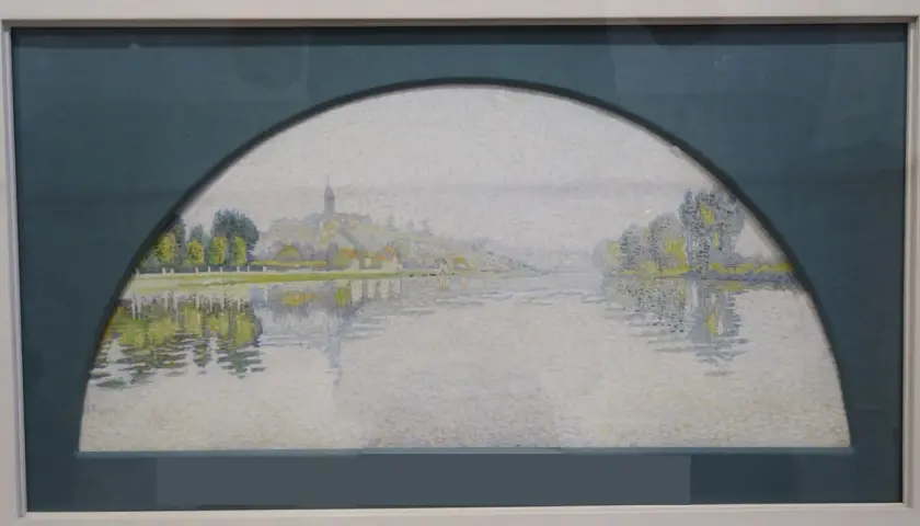Paysage fluvial impressionniste, évoquant une "manzana Pissarro" par ses touches de lumière et ses reflets sur l'eau.