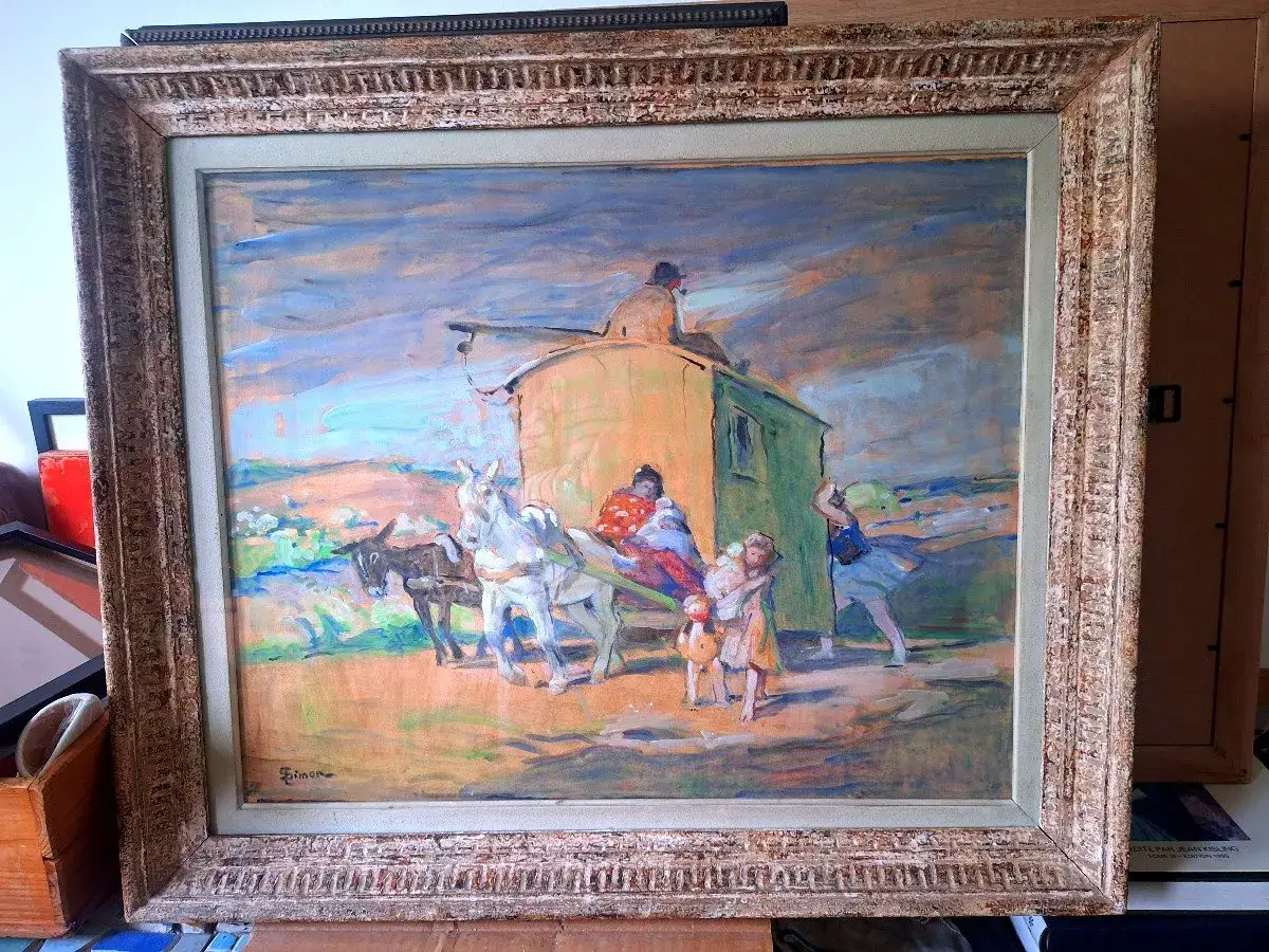 Tableau de Lucien Simon : une roulotte tir&eacute;e par des &acirc;nes, des personnages color&eacute;s sous un ciel orageux.